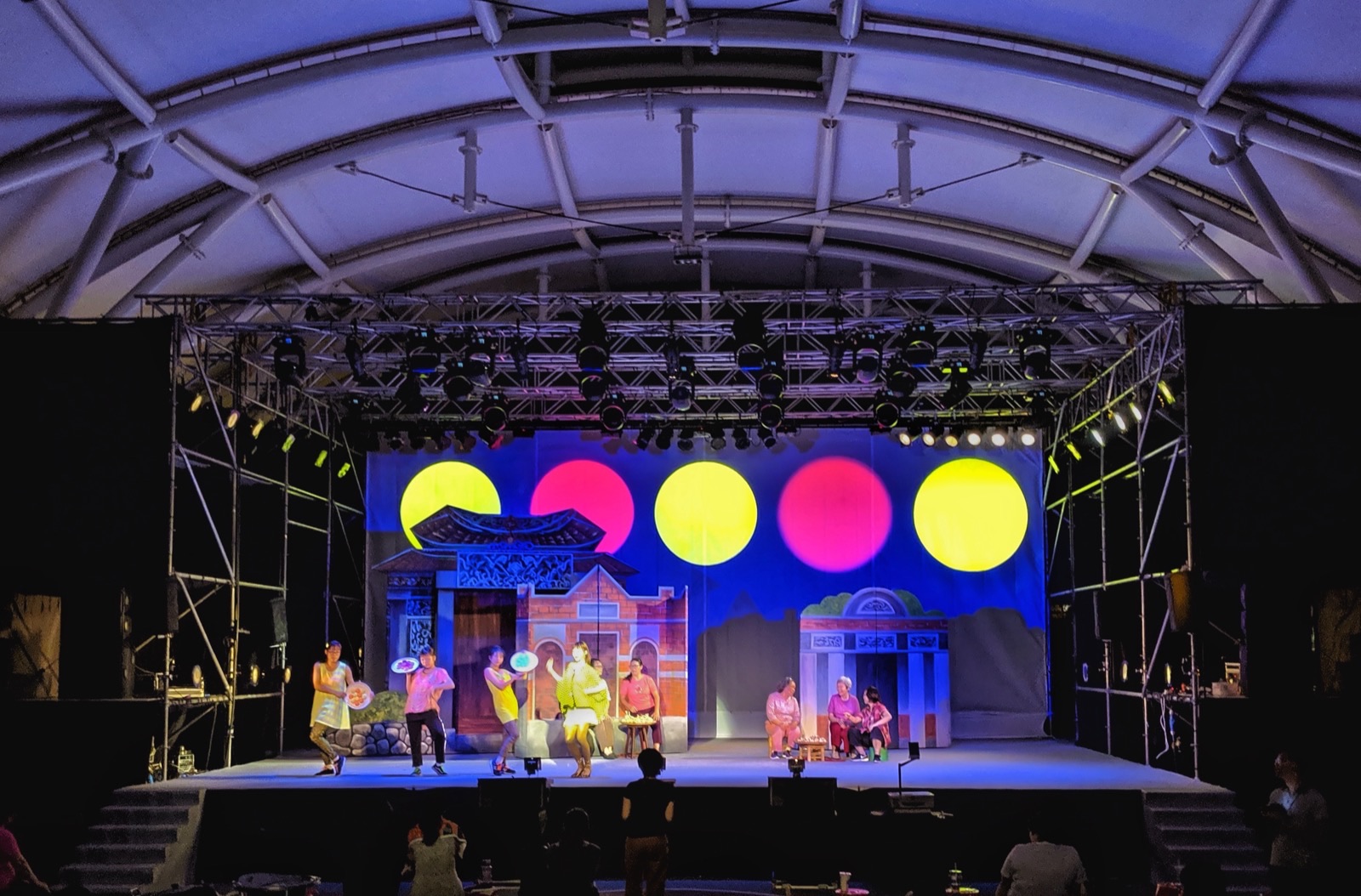 Colorful dot projections on stage