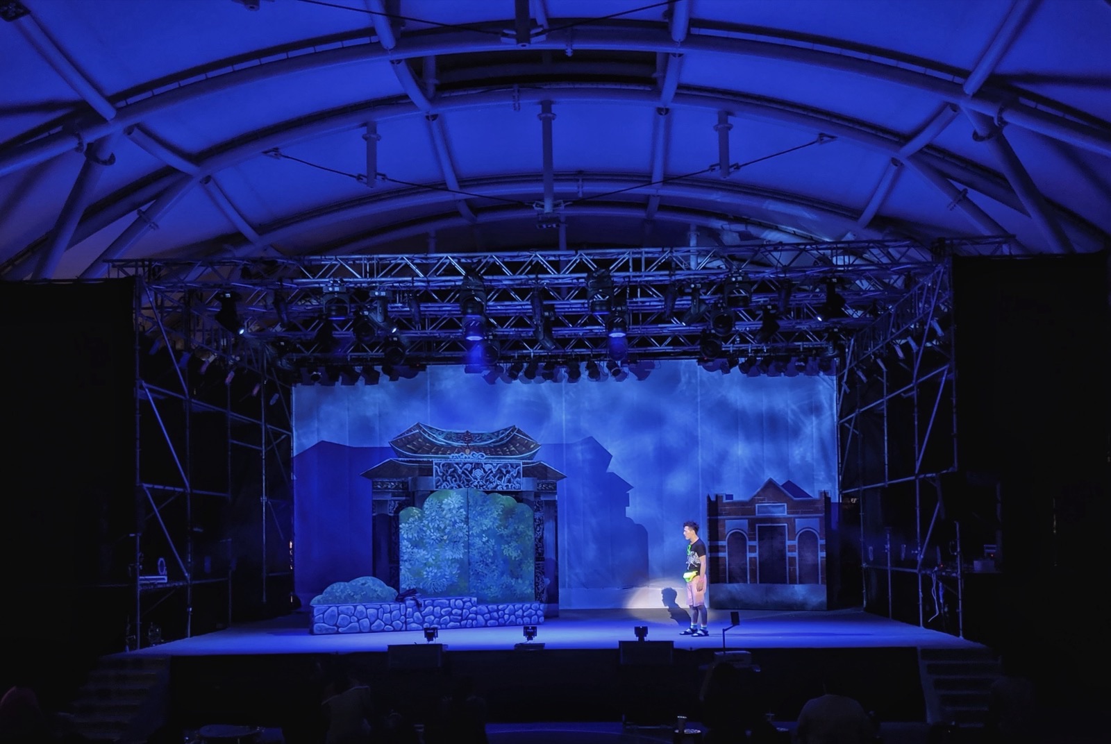 Solo performer in blue night