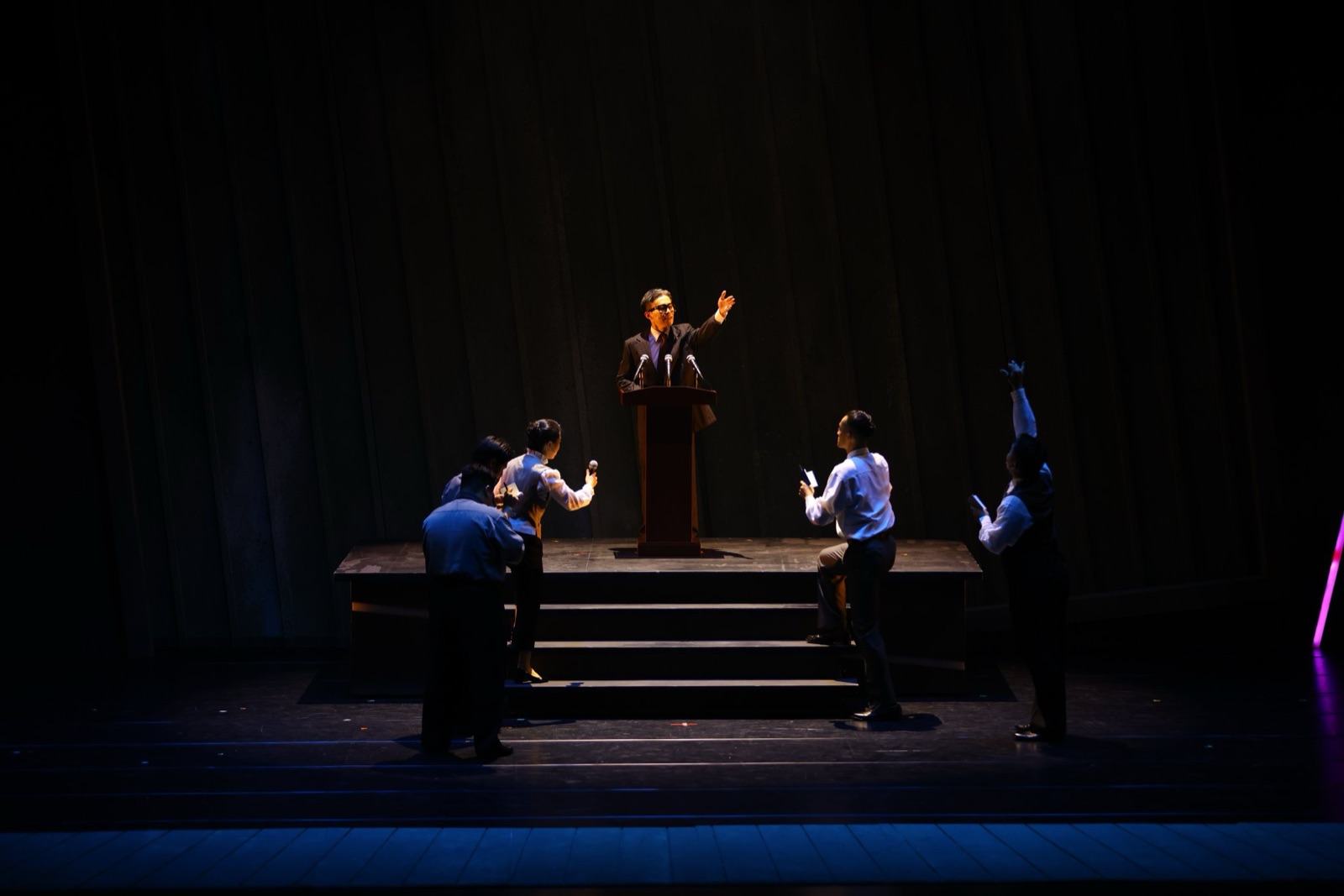 Political speech at podium with isolated spotlight