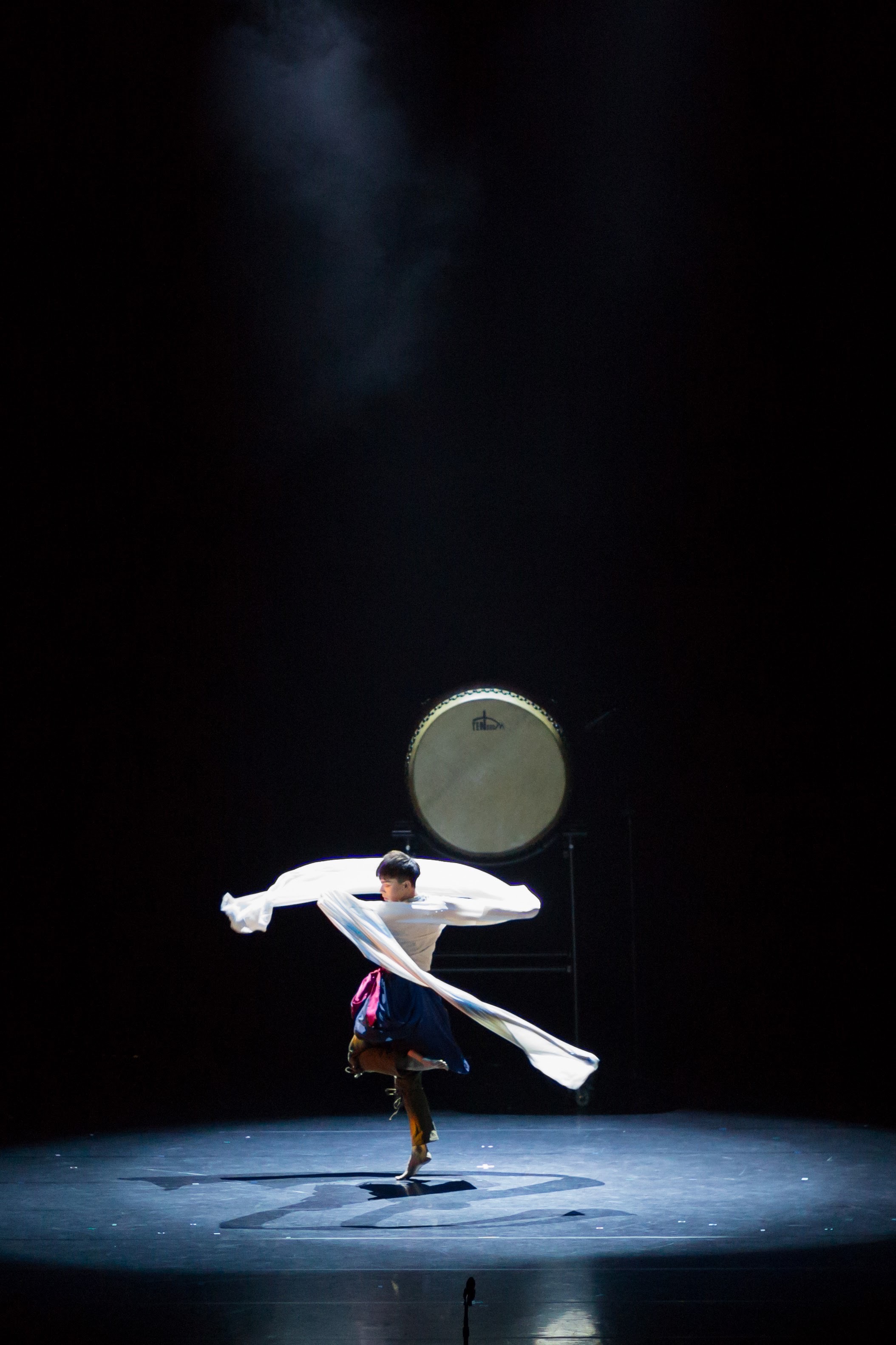 Dancer with flowing silk and large drum