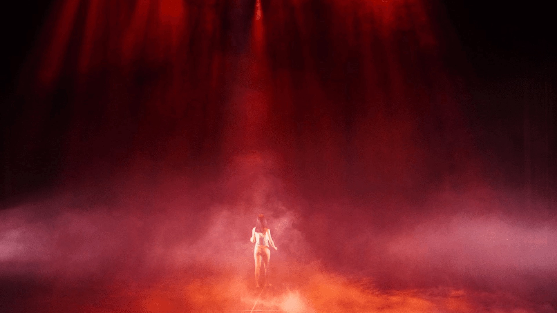 Red beams through smoke